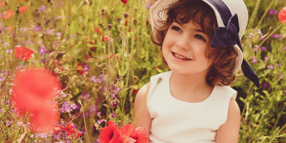 servizio fotografico bambini pisa toscana lucca bambina location girasoli